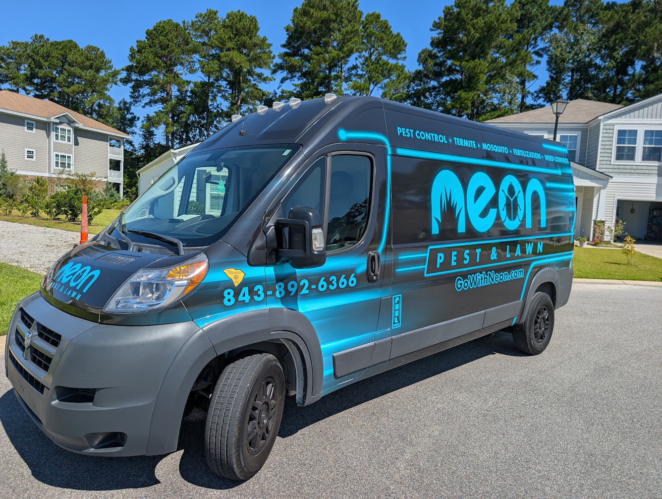 Neon Pest and Lawn service van