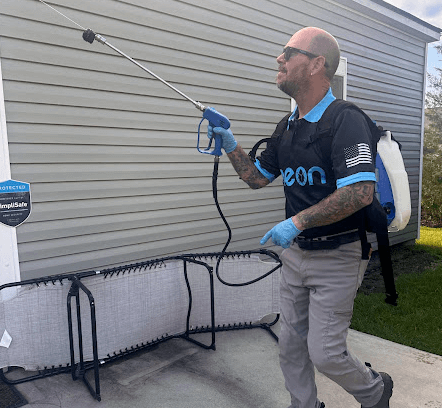 an employee of neon pest and lawn